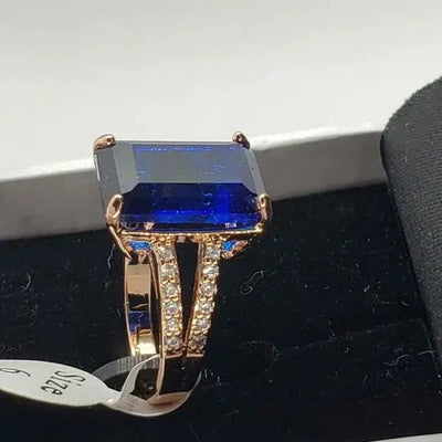 Brand New 18k rose gold plated ring w/ dark blue gemstone & cubic zirconia stones