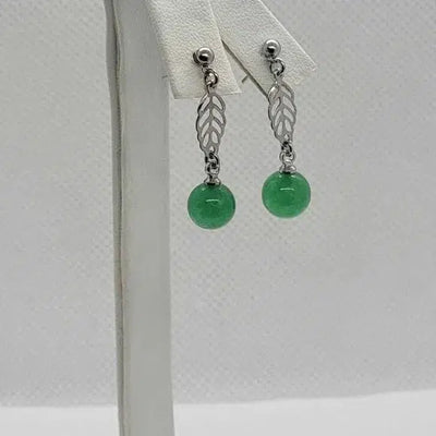 Brand New  Round Jade earrings with leaf design