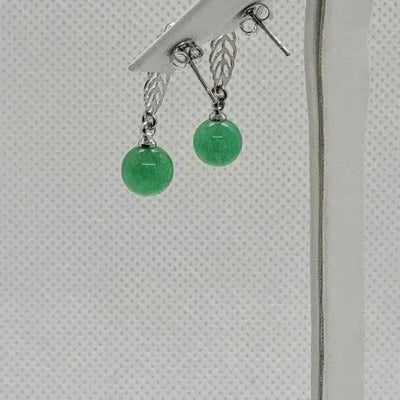 Brand New  Round Jade earrings with leaf design